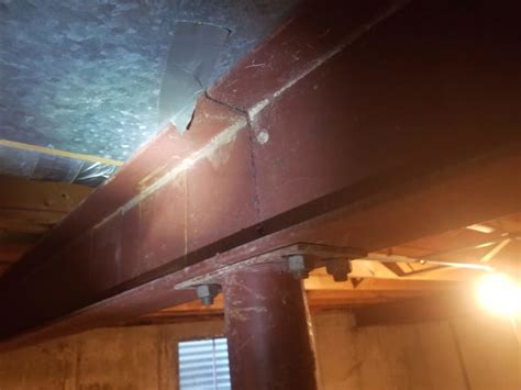 how to box in steel beam in basement|basement beam box.